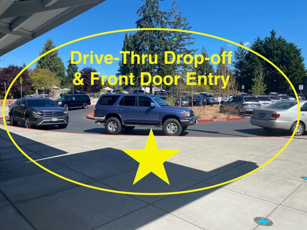 View of drop-off area by front entry for students arriving by car.